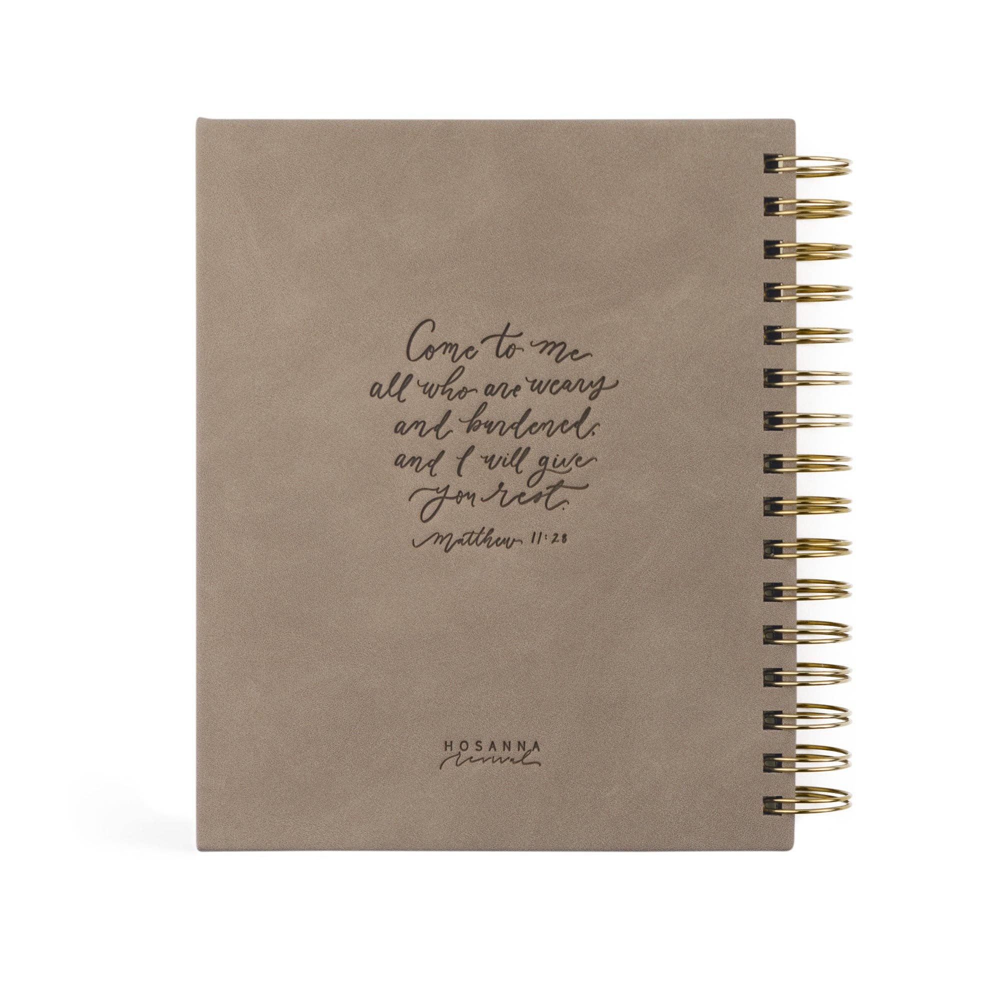 This planner includes a Month-at-a-Glance spread, a monthly calendar, weekly horizontal spreads, and extra note pages. With Scripture planted throughout the pages, each week has space to write out a “word for your week” in hopes that it would be a reminder of truth to guide your days.