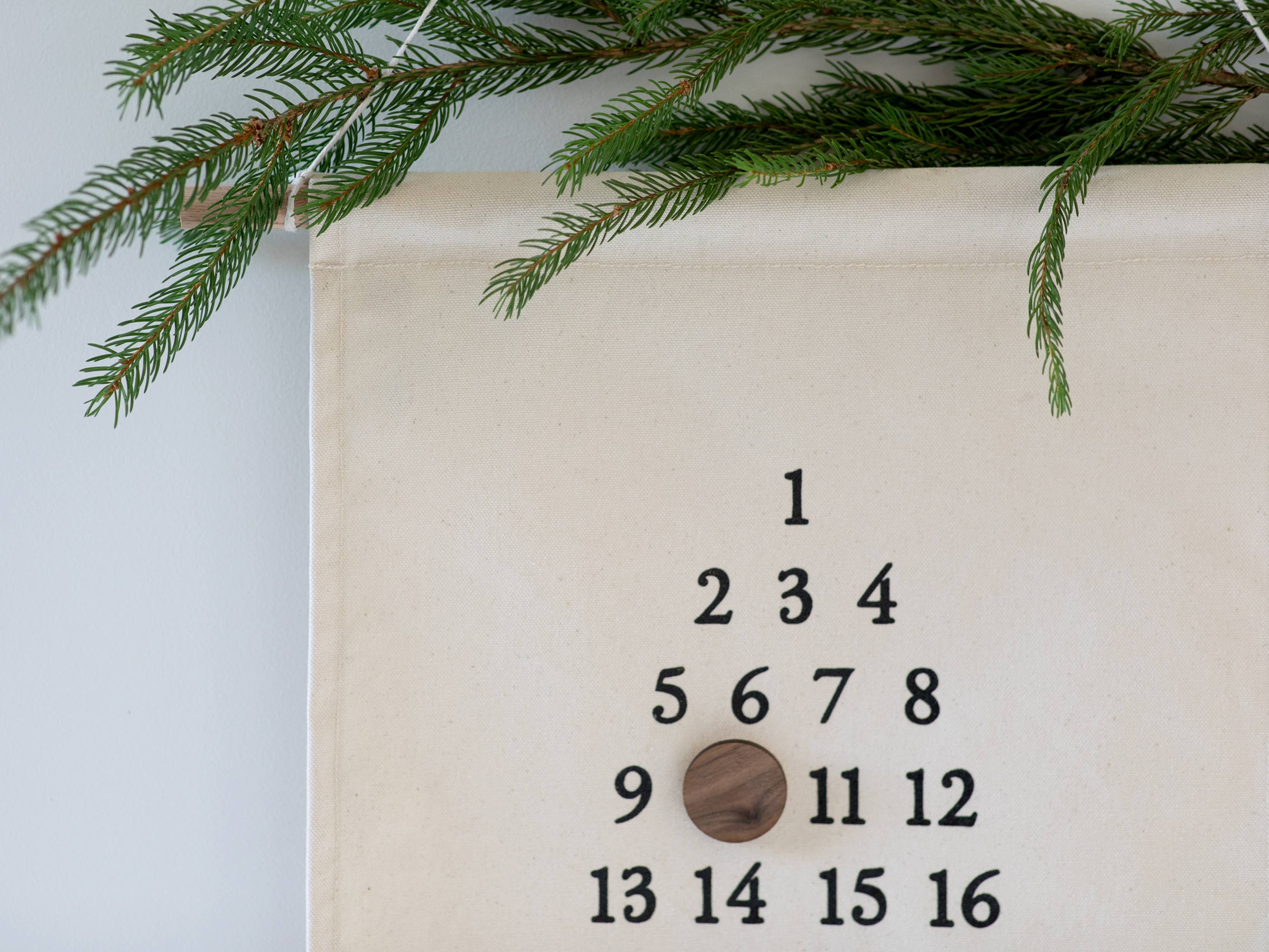 Get in the holiday spirit with our Canvas Advent Calendar! With a vintage typeface and measuring 14" by 20", it's the perfect way to count down to Christmas with the whole family. Add some fun to your holiday traditions and get yours today!
Walnut magnet measures approximately 1.25" in diameter and is safe for little hands.