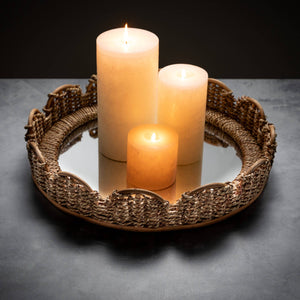 Elevate your decor with our Mirrored Woven Table Tray, meticulously crafted with a woven texture from organic bamboo. This luxurious table accessory features a mirrored panel, adding a touch of sophistication to any room. Indulge in this versatile piece for a stylish and fun addition to your home.