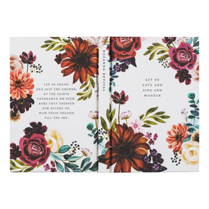 This notebook's jewel-toned design draws inspiration from the striking contrast of the Parque Retiro's rose garden and the white buildings lining Madrid's streets. The cover showcases the beloved hymn "Let Us Love and Sing and Wonder," serving as a beautiful expression and reminder of the glory and dominion of our Lord. Pair with our Madrid Inspired Journaling Bible for the perfect set.