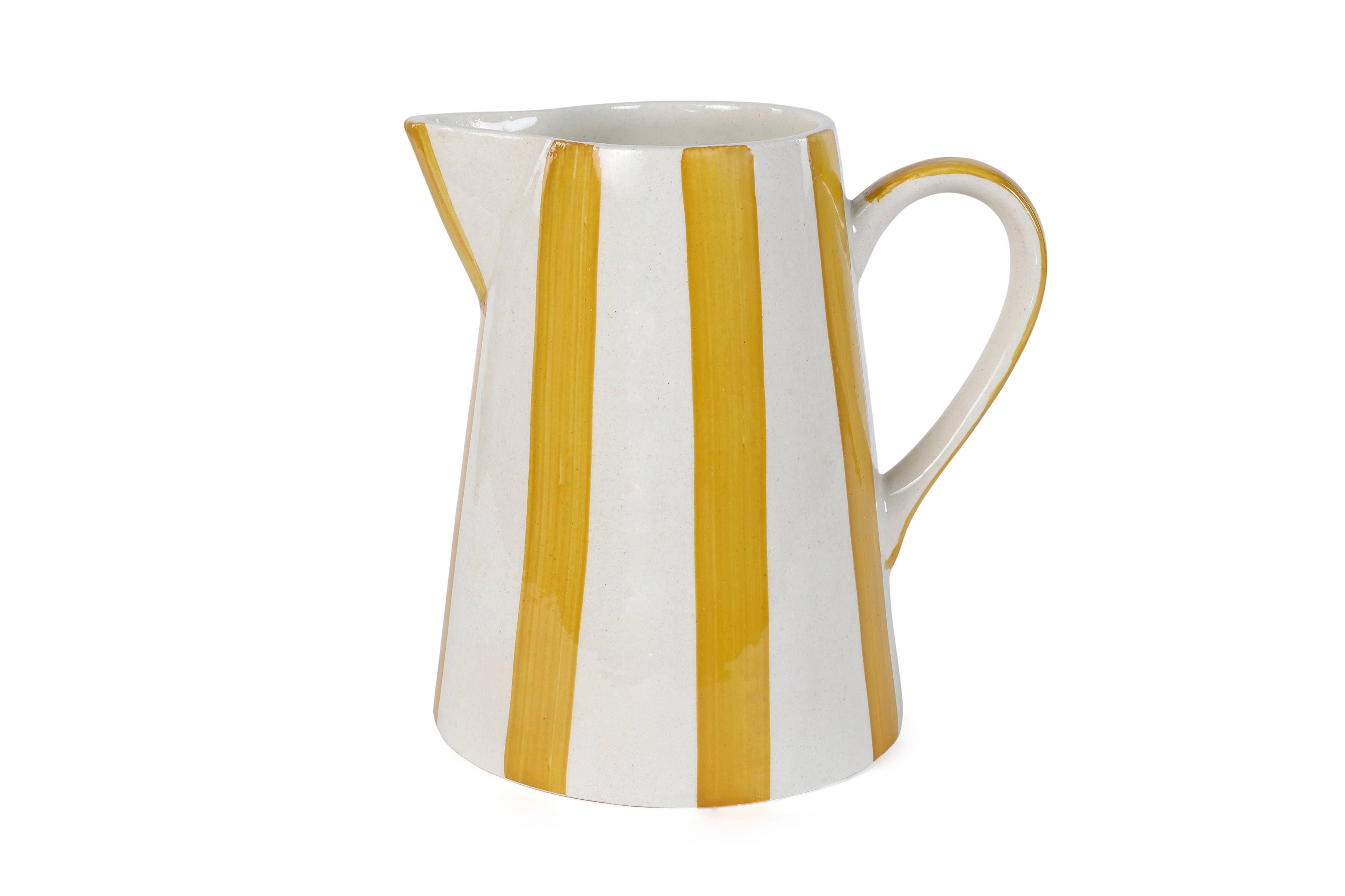 Elevate your home with this stylish and sturdy ceramic pitcher. Handcrafted with care, its playful stripes bring a touch of fun to your summer gatherings.

8.25 x 8.25 x 8
microwave and dishwasher safe
handpainted stoneware ceramic
artisan made