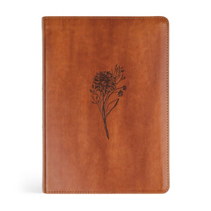 Brown leather ESV large print journaling Bible with floral embossing on a white background