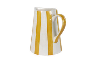 Elevate your home with this stylish and sturdy ceramic pitcher. Handcrafted with care, its playful stripes bring a touch of fun to your summer gatherings.

8.25 x 8.25 x 8
microwave &amp; dishwasher safe
handpainted stoneware ceramic
artisan made