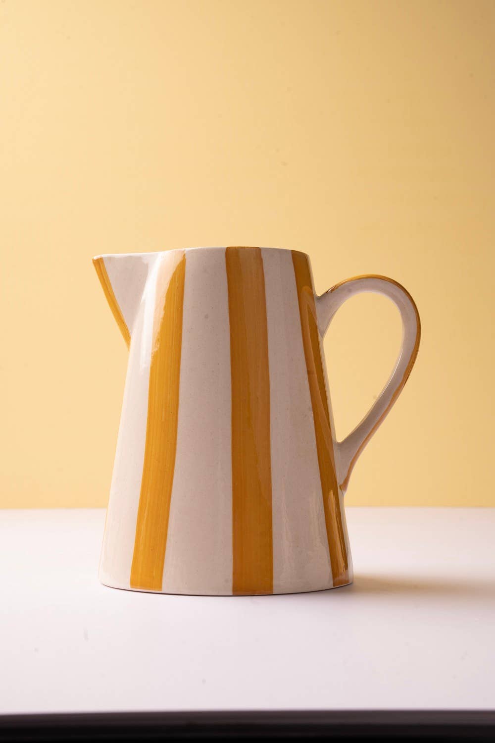stoneware ceramic striped pitcher