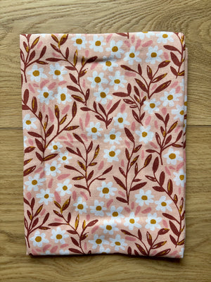 Spruce up your kitchen with our Tiny Floral Kitchen Towel! Made of 100% cotton, these tea towels are not only absorbent but also feature beautiful patterns that will brighten up your space. Perfect for spring, summer, and fall. 
