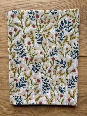 Spruce up your kitchen with our Tiny Floral Kitchen Towel! Made of 100% cotton, these tea towels are not only absorbent but also feature beautiful patterns that will brighten up your space. Perfect for spring, summer, and fall. 