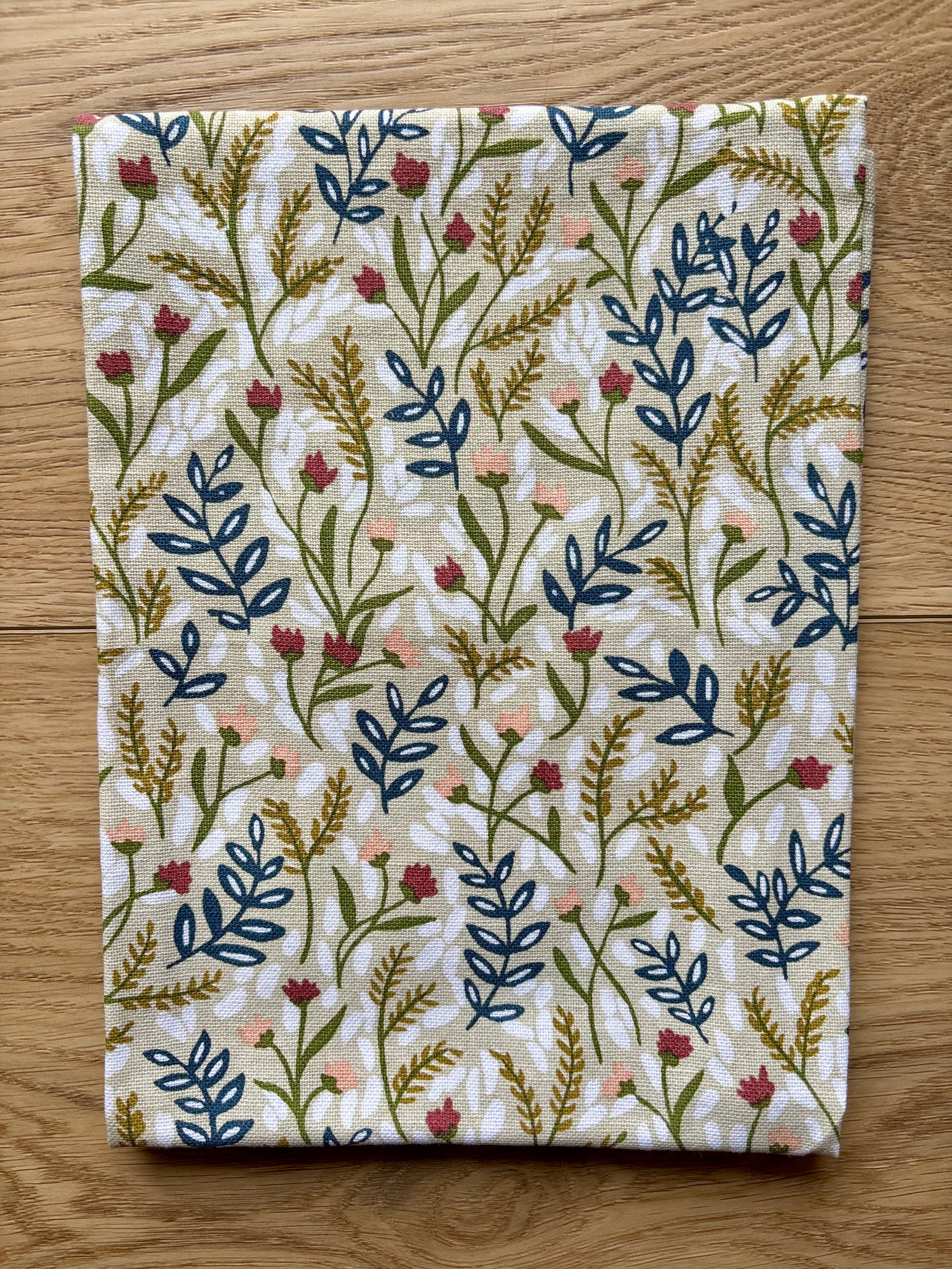Spruce up your kitchen with our Tiny Floral Kitchen Towel! Made of 100% cotton, these tea towels are not only absorbent but also feature beautiful patterns that will brighten up your space. Perfect for spring, summer, and fall. 