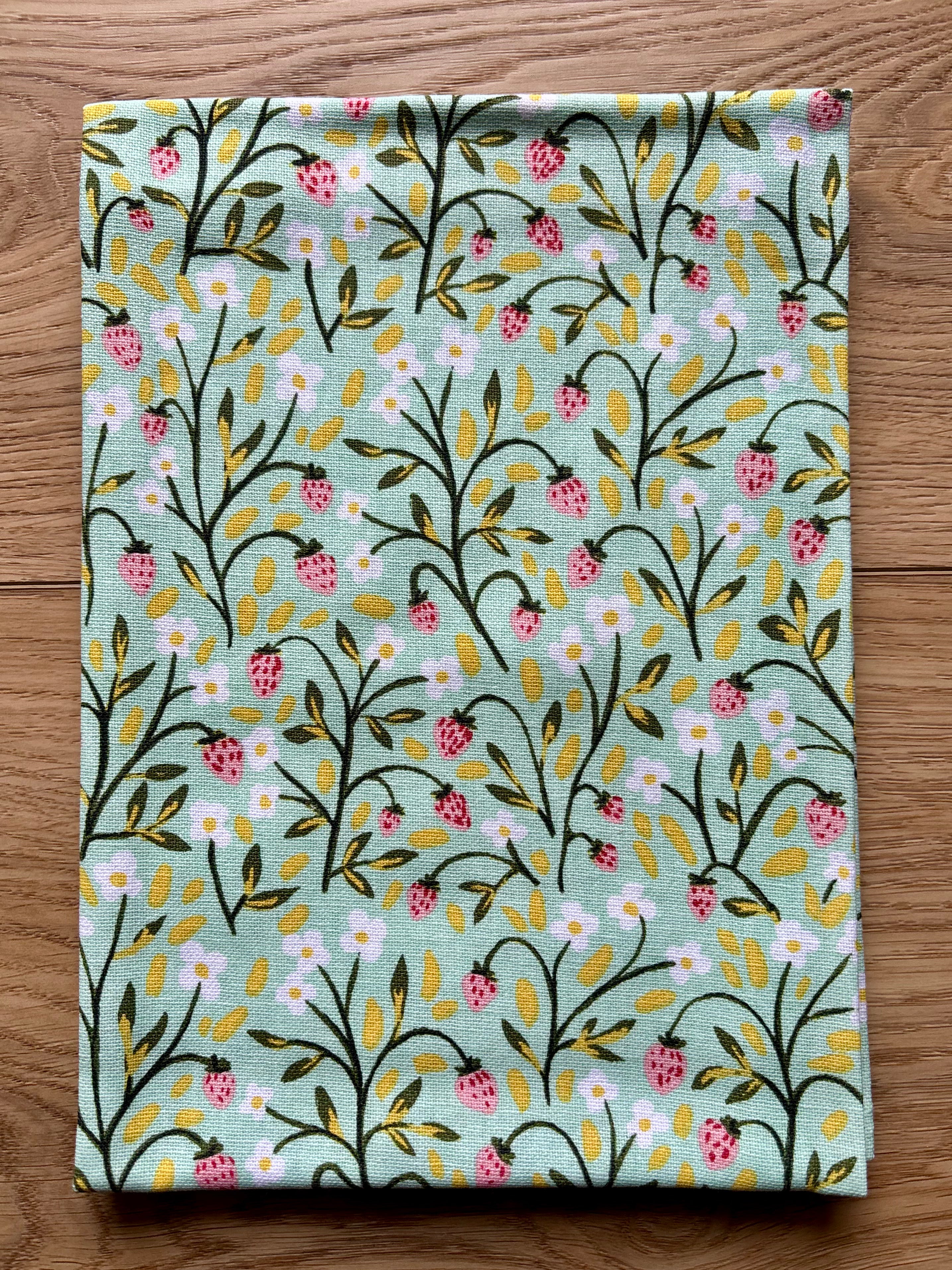Spruce up your kitchen with our Tiny Floral Kitchen Towel! Made of 100% cotton, these tea towels are not only absorbent but also feature beautiful patterns that will brighten up your space. Perfect for spring, summer, and fall. 