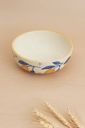 Add a pop of artistic flair to your dining experience with the charming design of the lemon bowl. Perfect for summer gatherings, this bowl will surely bring a smile and joy to any table.

2.5x7
microwave and dishwasher safe
handmade in India
ceramic